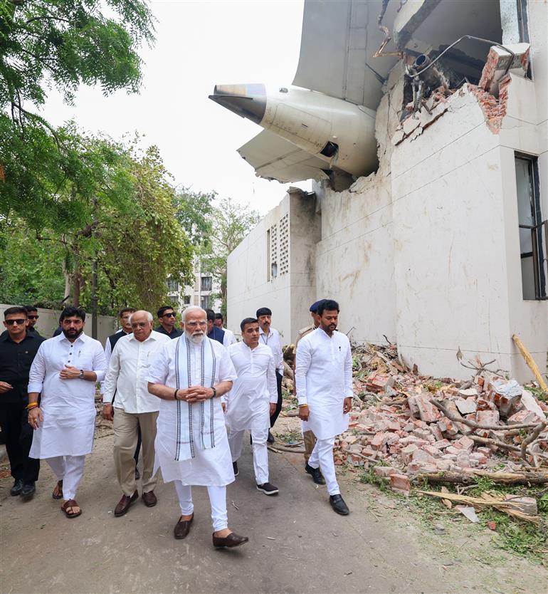 PM visits a crash site of the AI-171 flight that met with an accident at Ahmedabad, in Gujarat on June 13, 2025.