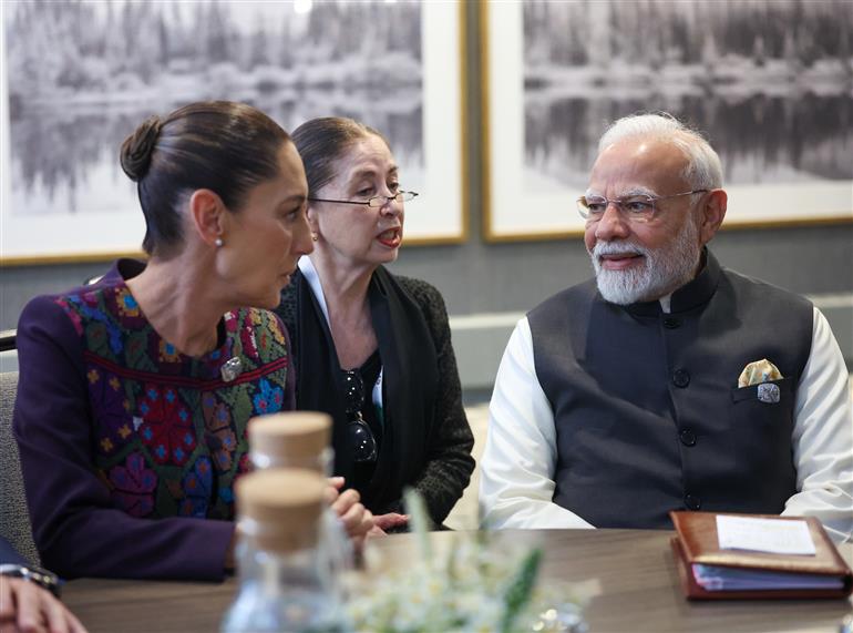 PM meets the President of Mexico, Ms. Claudia Sheinbaum Pardo on the sidelines of 51st G7 Summit at Kananaskis, in Canada on June 17, 2025.:Prime Minister's Office PM meets the President of Mexico, Ms. Claudia Sheinbaum Pardo on the sidelines of 51st G7 Summit at Kananaskis, in Canada on June 17, 2025.:Prime Minister