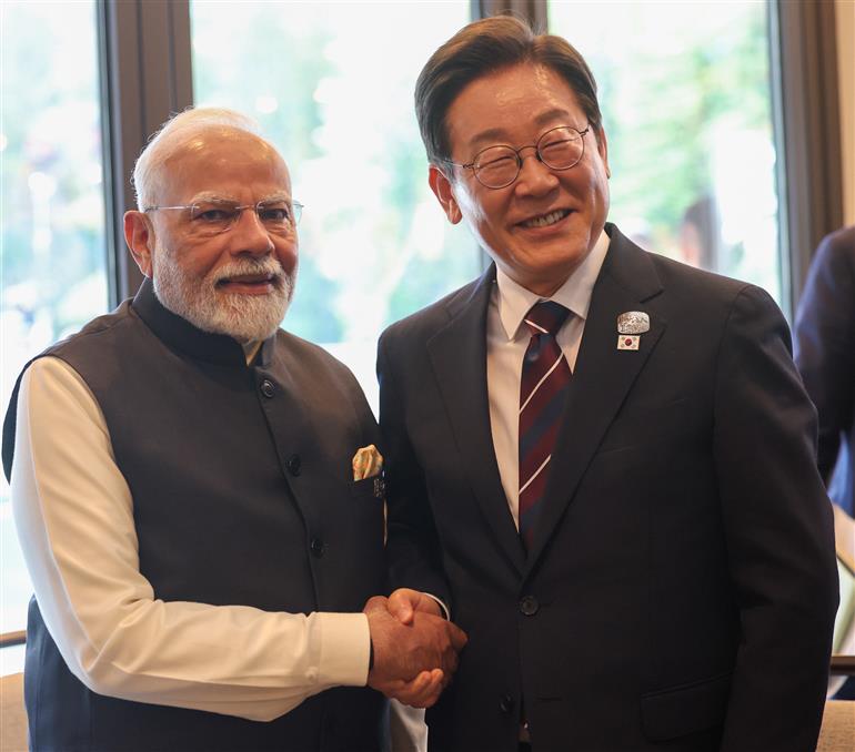 PM meets the President of South Korea, Mr. Lee Jae-myung on the sidelines of the 51st G7 Summit at Kananaskis, in Canada on June 17, 2025.:Prime Minister's Office PM meets the President of South Korea, Mr. Lee Jae-myung on the sidelines of the 51st G7 Summit at Kananaskis, in Canada on June 17, 2025.:Prime Minister