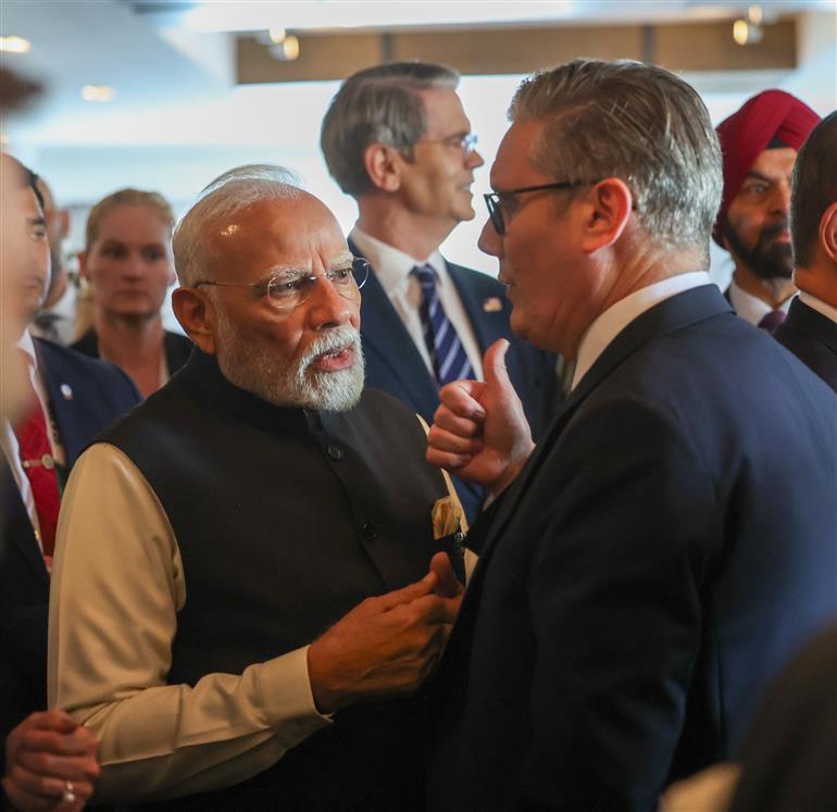 PM meets the Prime Minister of the United Kingdom, Mr. Keir Starmer on the sidelines of the 51st G7 Summit at Kananaskis, in Canada on June 17, 2025.:Prime Minister's Office PM meets the Prime Minister of the United Kingdom, Mr. Keir Starmer on the sidelines of the 51st G7 Summit at Kananaskis, in Canada on June 17, 2025.:Prime Minister