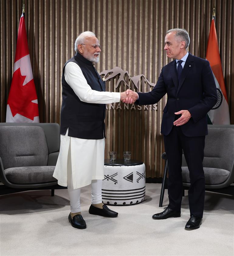 PM holds a bilateral meeting with the Prime Minister of Canada, Mr. Mark Joseph Carney on the sidelines of the 51st G7 Summit at Kananaskis, in Canada on June 17, 2025.:Prime Minister's Office PM holds a bilateral meeting with the Prime Minister of Canada, Mr. Mark Joseph Carney on the sidelines of the 51st G7 Summit at Kananaskis, in Canada on June 17, 2025.:Prime Minister