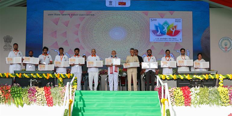 PM releases a special postal stamp commemorating 11th International Day of Yoga celebrations at Visakhapatnam, in Andhra Pradesh on June 21, 2025.:Prime Minister