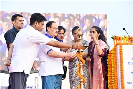 The Union Minister of Health and Family Welfare & Chemicals and Fertilizers, Shri Jagat Prakash Nadda lighting the lamp at the celebration of the 11th International Day of Yoga (IDY) 2025 at Kartavya Path, in New Delhi on June 21, 2025.:Ministry of Health and Family Welfare