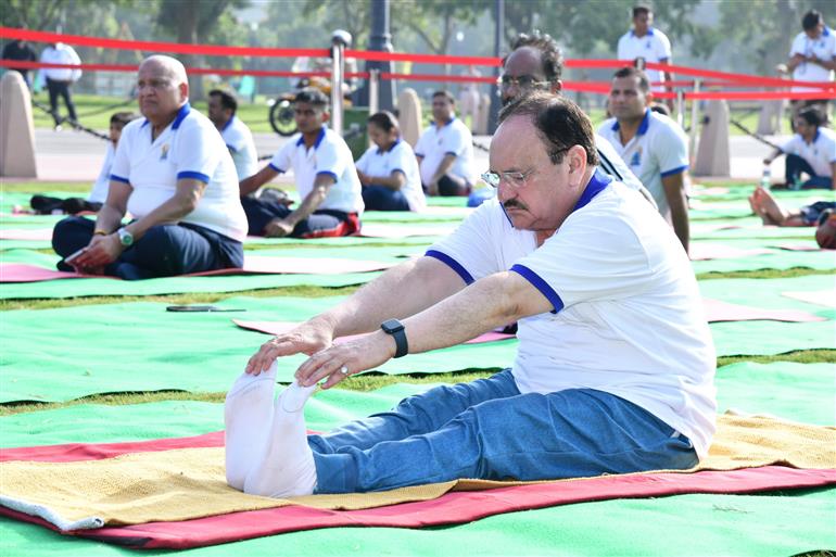 The Union Minister of Health and Family Welfare & Chemicals and Fertilizers, Shri Jagat Prakash Nadda participated in the celebration of the 11th International Day of Yoga (IDY) 2025 by leading a mass yoga demonstration with hundreds of participants at Kartavya Path, in New Delhi on June 21, 2025.:Ministry of Health and Family Welfare