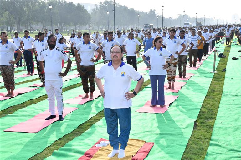 The Union Minister of Health and Family Welfare & Chemicals and Fertilizers, Shri Jagat Prakash Nadda participated in the celebration of the 11th International Day of Yoga (IDY) 2025 by leading a mass yoga demonstration with hundreds of participants at Kartavya Path, in New Delhi on June 21, 2025.:Ministry of Health and Family Welfare