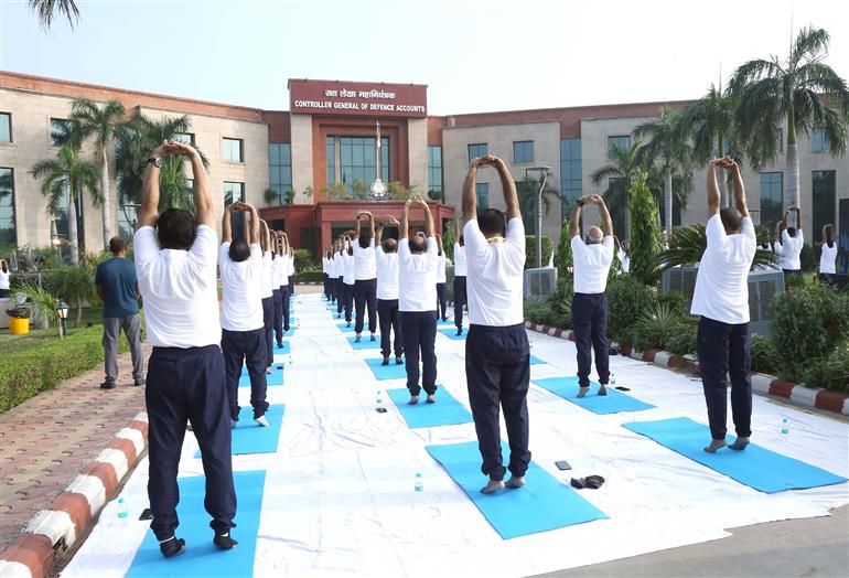 The Defence Secretary, Shri Rajesh Kumar Singh participated in the celebration of the 11th International Day of Yoga (IDY) 2025 at Office of Controller General Defence Accounts, in New Delhi on June 21, 2025.:Ministry of Defence