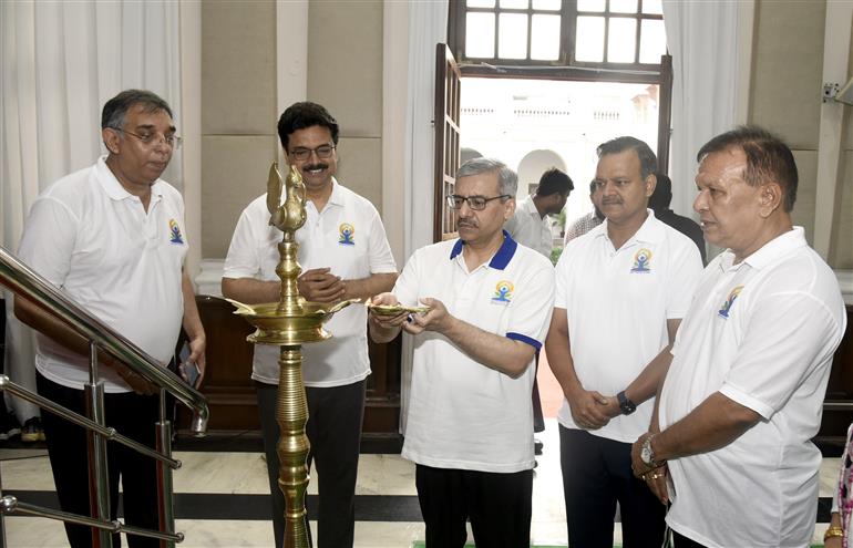 The Secretary, Department of Higher Education Dr. Vineet Joshi lighting the lamp during the 11th International Day of Yoga celebrations, in New Delhi on June 21, 2025.:Ministry of Education