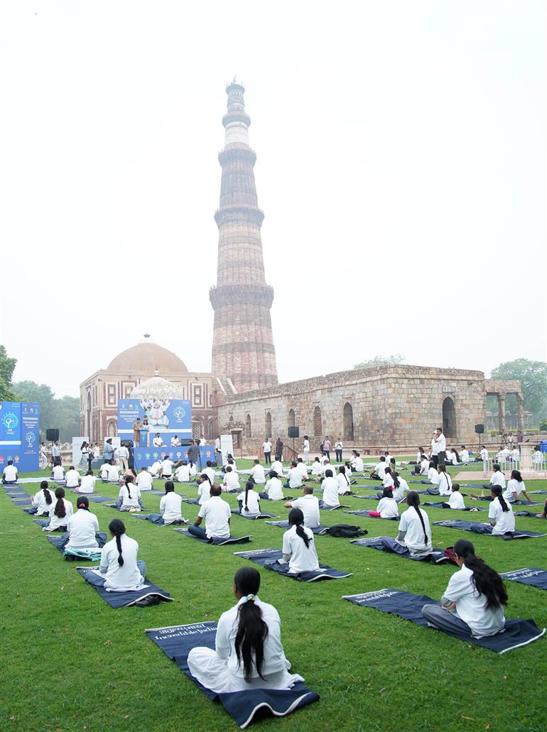 Glimpses of 11th International Yoga Day celebrations organised by Ministry of Tourism at Qutub Minar Complex, in Delhi on June 21, 2025.:Ministry of Tourism
