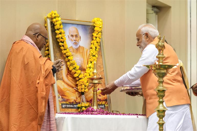 PM pays floral tributes to Sree Narayana Guru during the centenary celebration of historic conversation between Sree Narayana Guru & Mahatma Gandhi at Vigyan Bhawan, in New Delhi on June 24, 2025.