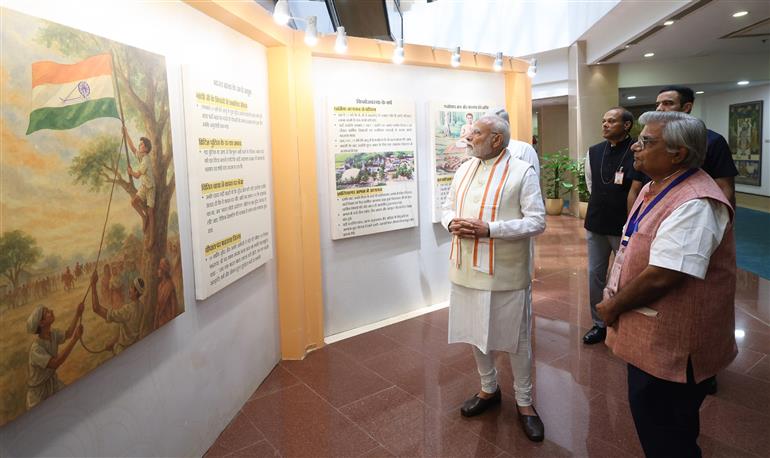 PM visits an exhibition on the Centenary Celebrations of Acharya Vidyanand Ji Maharaj at Vigyan Bhawan, in New Delhi on June 28, 2025.