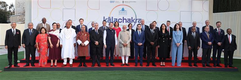 PM in a group photograph during the Raisina Dialogue 2025, in New Delhi on March 17, 2025.