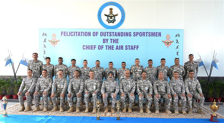 Air Chief Marshal AP Singh, Chief of the Air Staff in a group photograph with the meritorious sportsmen of IAF at a ceremony, in New Delhi on March 21, 2025.