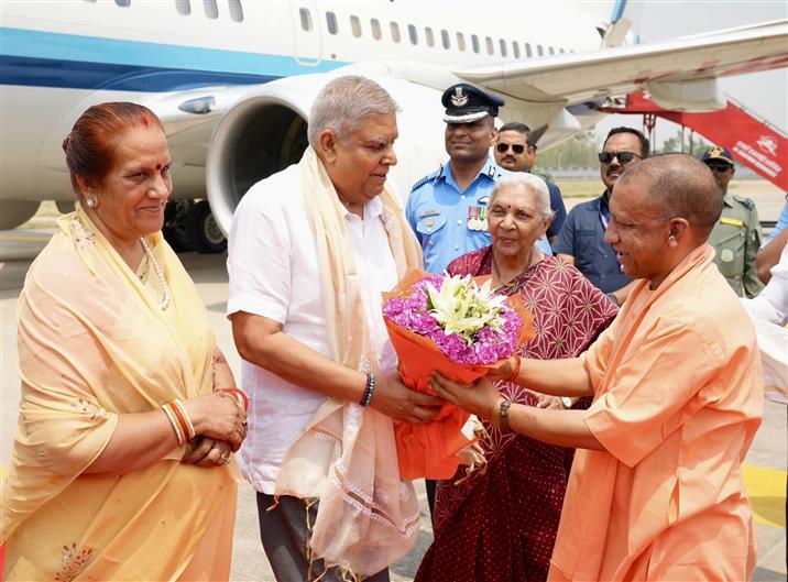 The Vice President of India, Shri Jagdeep Dhankhar and Dr. Sudesh Dhankhar being welcomed by Smt. Anandiben Patel, Governor of Uttar Pradesh, Shri Yogi Adityanath, Chief Minister of Uttar Pradesh, Shri Brajesh Pathak, Deputy Chief Minister of Uttar Pradesh, Shri Bhupendra Singh Choudhary, Member of Uttar Pradesh Legislative Council and other dignitaries on his arrival in Lucknow, Uttar Pradesh on May 1, 2025.