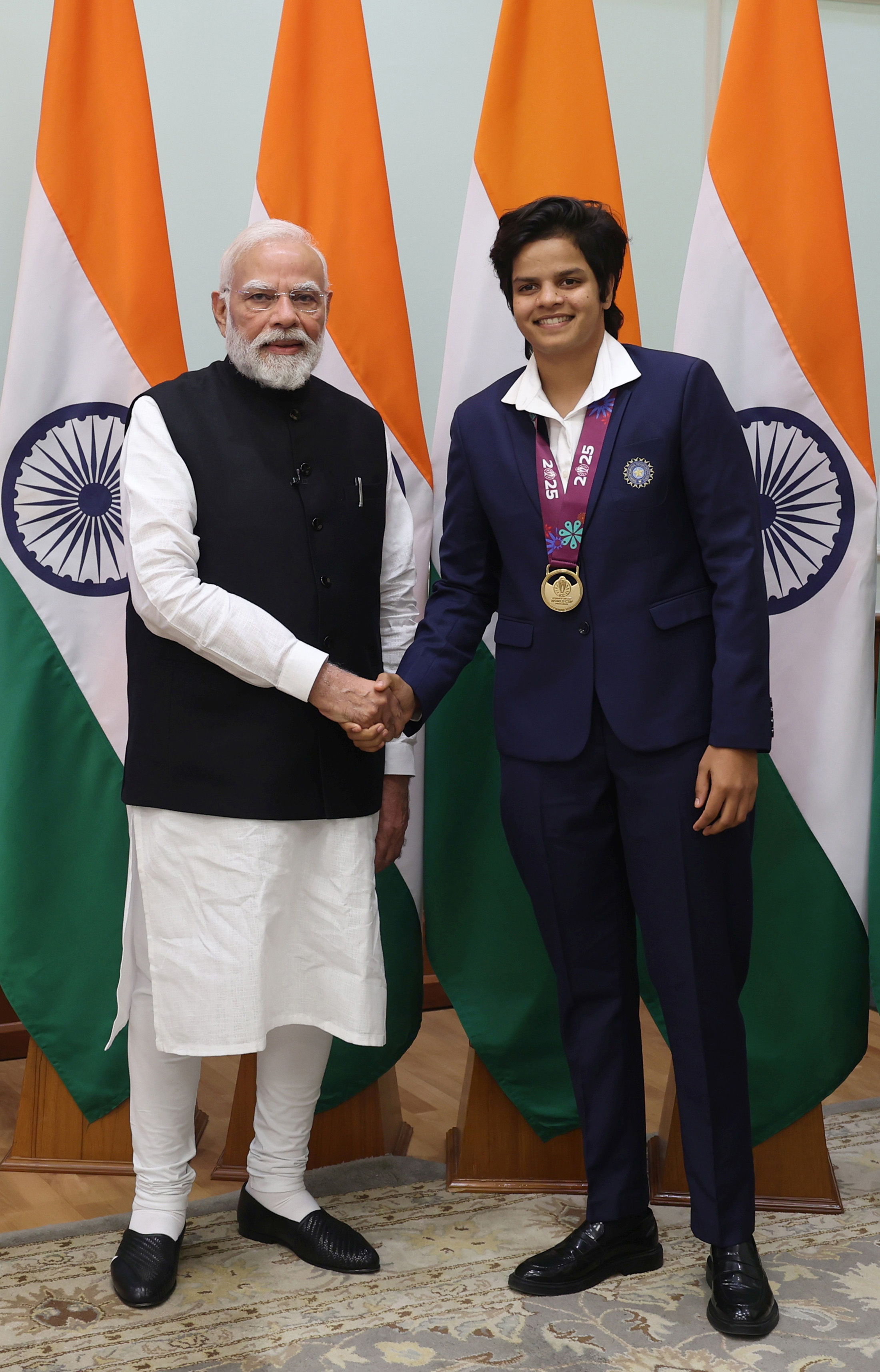 PM shake hands with Indian Women Cricket Team Players at 7, Lok Kalyan Marg, in New Delhi on November 05, 2025.