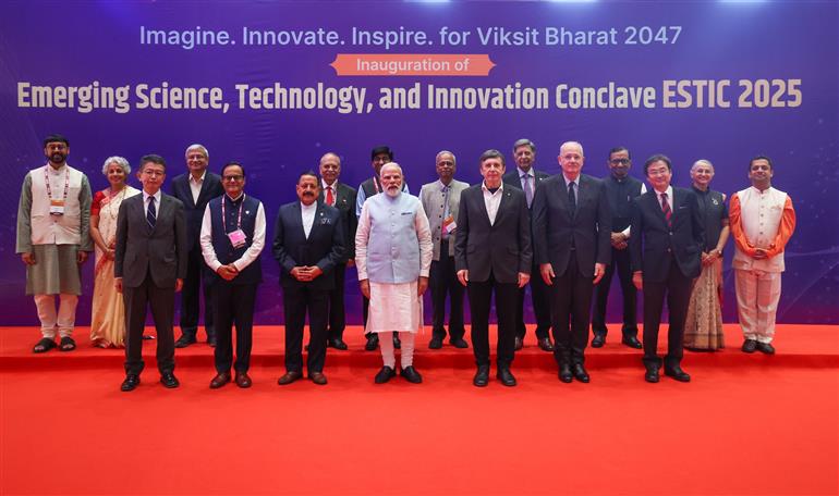 PM in a group photograph during the inauguration of the Emerging Science, Technology and Innovation Conclave 2025 at Bharat Mandapam, in New Delhi on November 03, 2025.
