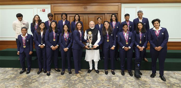 PM in a group photograph with Indian Women Cricket Team Players at 7, Lok Kalyan Marg , in New Delhi on November 05, 2025.