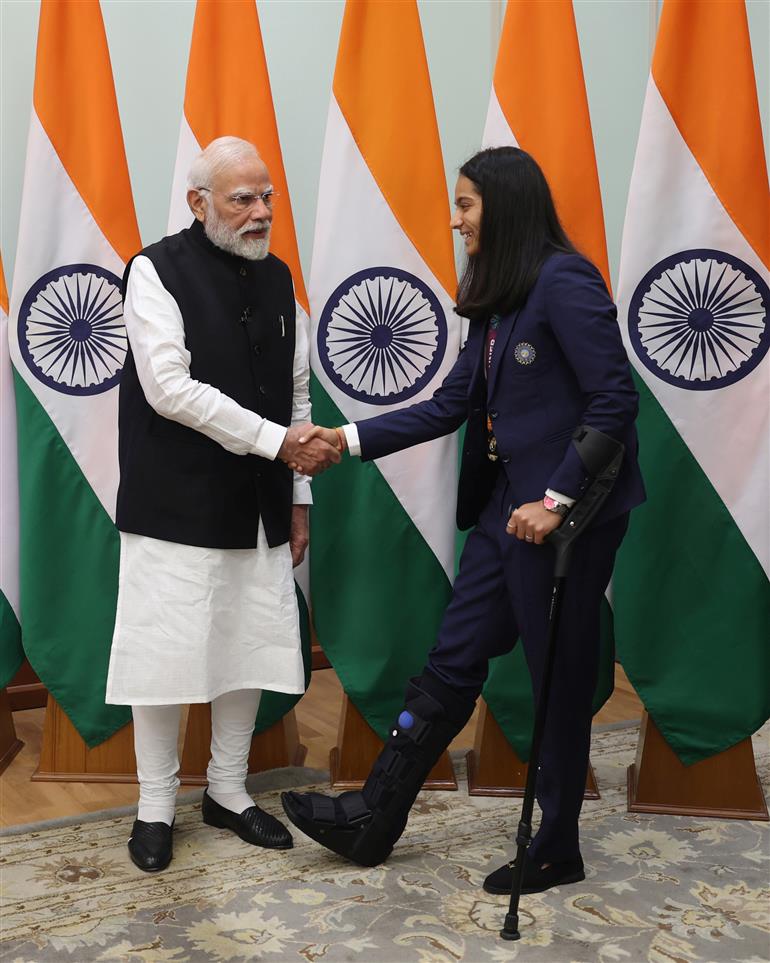 PM shake hands with Indian Women Cricket Team Players at 7, Lok Kalyan Marg, in New Delhi on November 05, 2025.