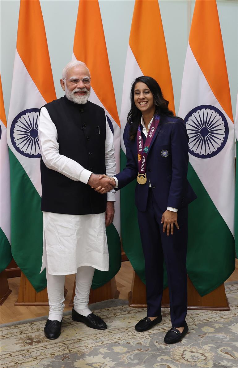 PM shake hands with Indian Women Cricket Team Players at 7, Lok Kalyan Marg, in New Delhi on November 05, 2025.