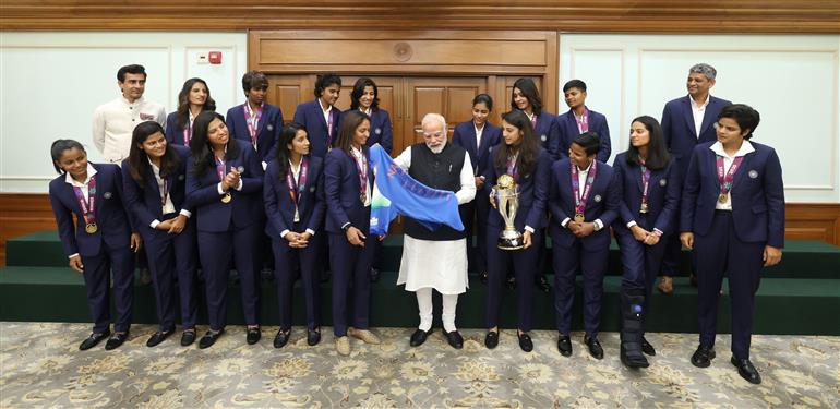 PM in a group photograph with Indian Women Cricket Team Players at 7, Lok Kalyan Marg, in New Delhi on November 05, 2025.