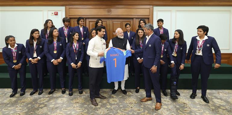 PM in a group photograph with Indian Women Cricket Team Players at 7, Lok Kalyan Marg, in New Delhi on November 05, 2025.