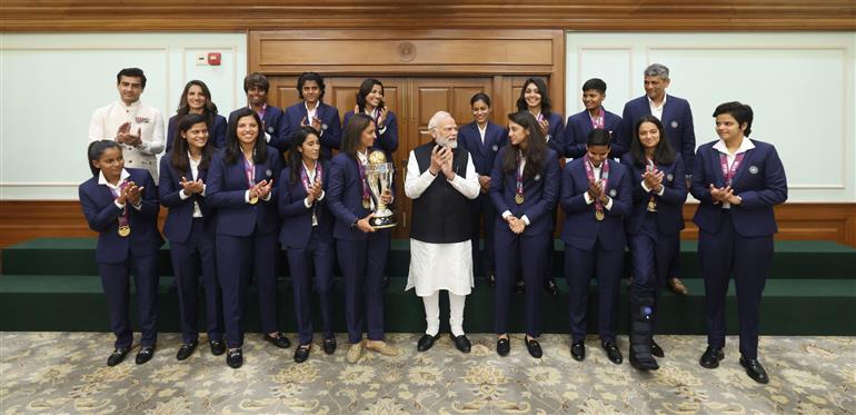 PM in a group photograph with Indian Women Cricket Team Players at 7, Lok Kalyan Marg, in New Delhi on November 05, 2025.