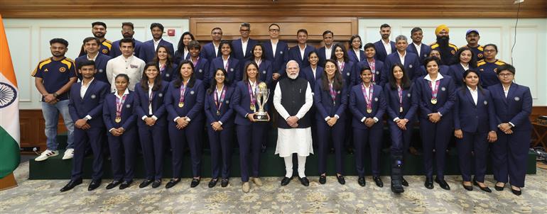 PM in a group photograph with Indian Women Cricket Team Players at 7, Lok Kalyan Marg, in New Delhi on November 05, 2025.
