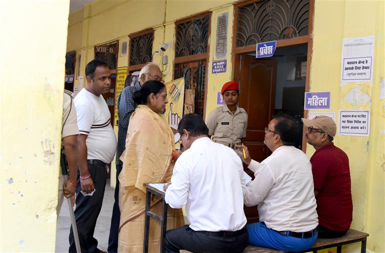 voters standing in queue to cast their votes at a polling booth during the 1st phase of the Bihar Assembly Election 2025 at Sri Guru Govind Singh Girl High School, Patna Sahib in Patna, Bihar on November 06, 2025.