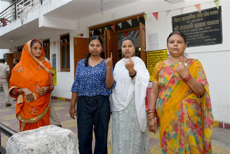 Voters showing mark of indelible ink after casting their votes at a polling booth during the 1st phase of the Bihar Assembly Election 2025 at Bankipur in Patna, Bihar on November 06, 2025.