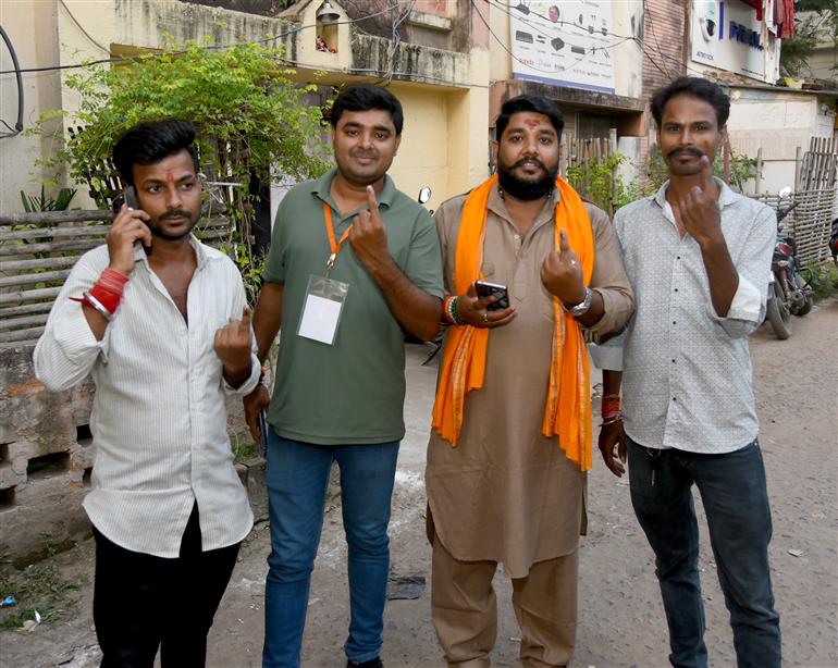 Voters showing mark of indelible ink after casting their votes at a polling booth during the 1st phase of the Bihar Assembly Election 2025 at Bankipur in Patna, Bihar on November 06, 2025.