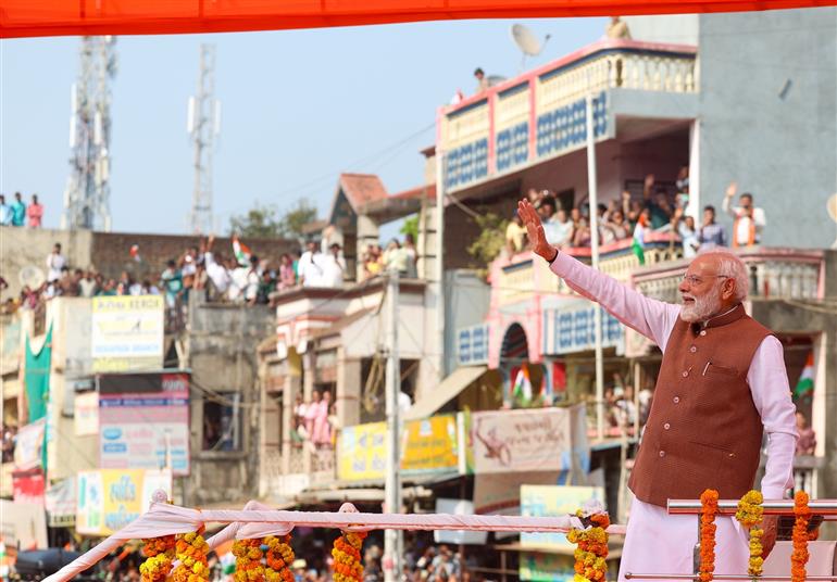 PM receives warm welcome by enthusiastic crowd during the Grand Road Show on his arrival at Narmada, in Gujarat on November 15, 2025.