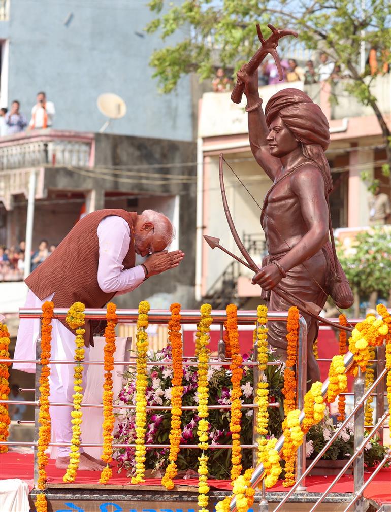 PM pays tribute to Bhagwan Birsa Munda on his 150th birth anniversary at Narmada, in Gujarat on November 15, 2025.