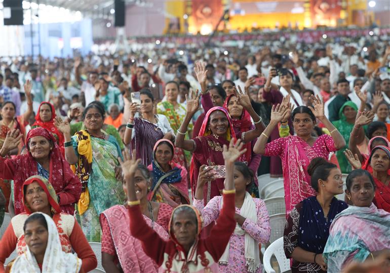 PM receives warm welcome by people during the inauguration and laying the foundation stone of development projects at Narmada, in Gujarat on November 15, 2025.