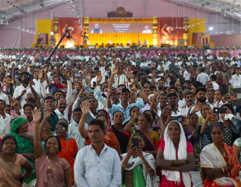 PM receives warm welcome by people during the inauguration and laying the foundation stone of development projects at Narmada, in Gujarat on November 15, 2025.