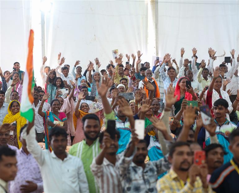 PM receives warm welcome by people during the inauguration and laying the foundation stone of development projects at Narmada, in Gujarat on November 15, 2025.