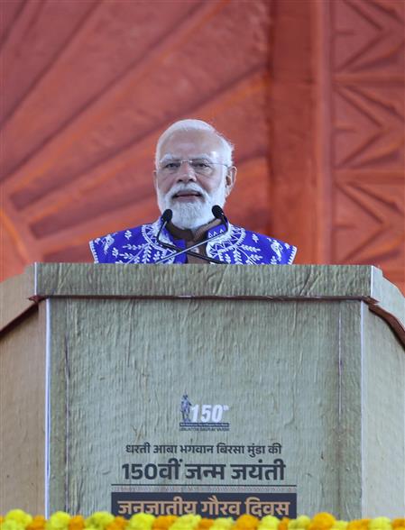 PM addressing the gathering at the inauguration and laying the foundation stone of development projects at Narmada, in Gujarat on November 15, 2025.