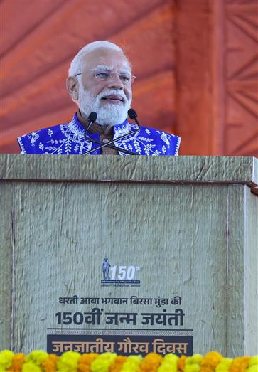 PM addressing the gathering at the inauguration and laying the foundation stone of development projects at Narmada, in Gujarat on November 15, 2025.