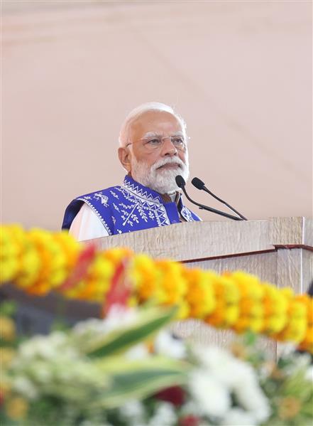 PM addressing the gathering at the inauguration and laying the foundation stone of development projects at Narmada, in Gujarat on November 15, 2025.
