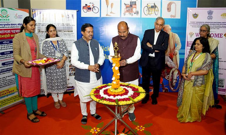 The Union Minister for Social Justice and Empowerment, Dr. Virendra Kumar lighting the lamp at the inauguration of the stalls operated by the Ministry of Social Justice and Empowerment at the 44th India International Trade Fair (IITF-2025) at Bharat Mandapam, in New Delhi on November 17, 2025.