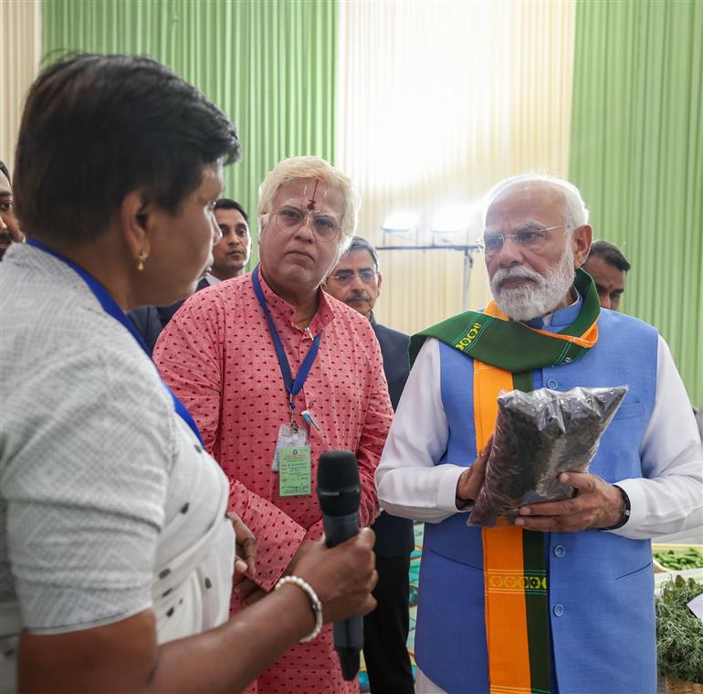 PM visits an exhibition and engages with farmers during the inauguration of the South India Natural Farming Summit 2025 at Coimbatore, in Tamil Nadu on November 19, 2025.
