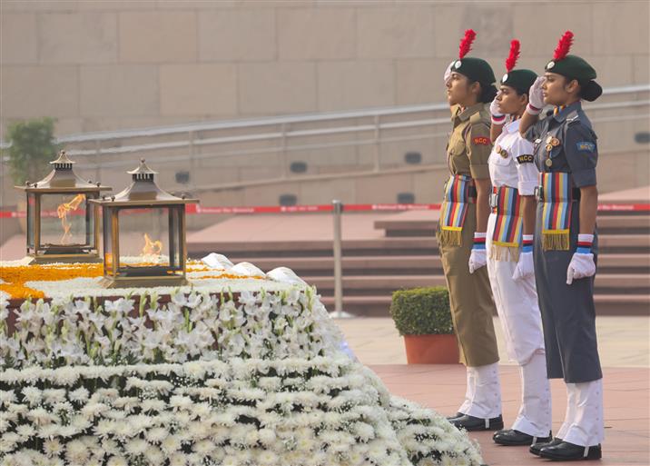 Three NCC girl cadets lays wreath and pays glowing tributes to the fallen heroes during the 78th Raising Day of the National Cadet Corps at the National War Memorial, in New Delhi, on November 22, 2025.