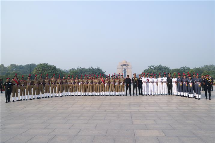 The Defence Secretary Shri Rajesh Kumar Singh and the Director General NCC Lt Gen Virendra Vats in a group photograph with the NCC cadets during the 78th Raising Day of the National Cadet Corps at the National War Memorial, in New Delhi, on November 22, 2025.