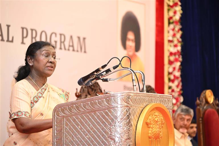 The President of India, Smt Droupadi Murmu, addressing at the special session to commemorate the centenary celebration of Sri Sathya Sai Baba at Prasanthi Nilayam, Puttaparthi, in Andhra Pradesh on November 22, 2025.
