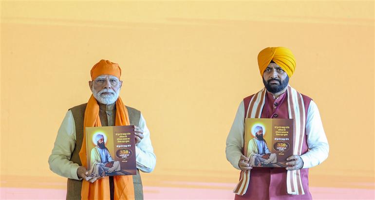 PM participates in a special programme commemorating the 350th Shaheedi Diwas of Guru Tegh Bahadur, the revered ninth Sikh Guru, at Kurukshetra, in Haryana on November 25, 2025.