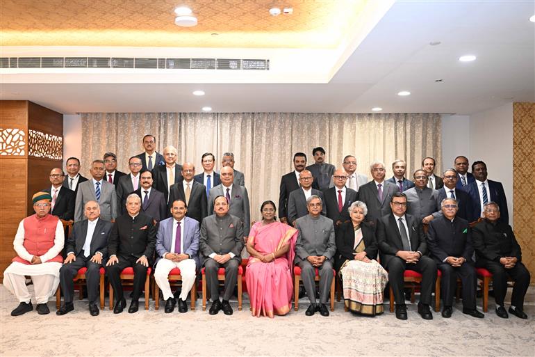 The President of India, Smt Droupadi Murmu in a group photograph at the Constitution Day celebrations organised by the Supreme Court of India, in New Delhi on November 26, 2025.