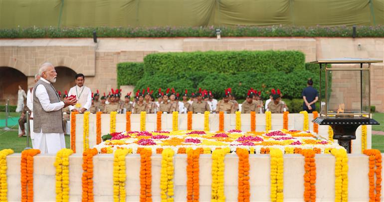 PM paying floral tributes at the Samadhi of Mahatma Gandhi on the occasion of Gandhi Jayanti at Rajghat, in Delhi on October 02, 2025.