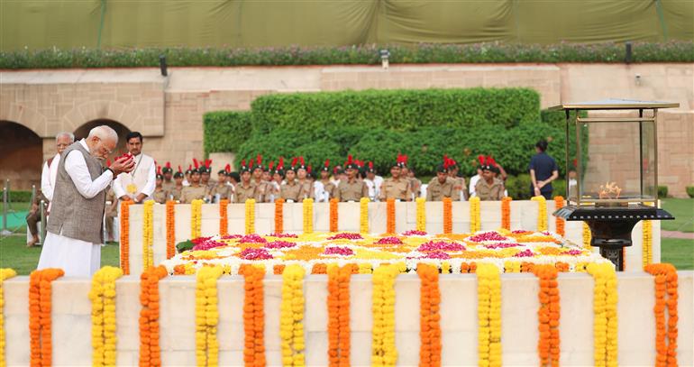 PM paying floral tributes at the Samadhi of Mahatma Gandhi on the occasion of Gandhi Jayanti at Rajghat, in Delhi on October 02, 2025.