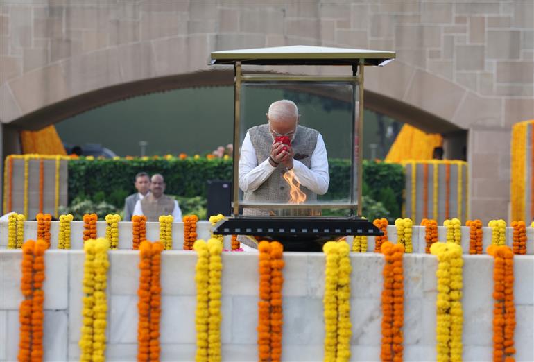 PM paying floral tributes at the Samadhi of Mahatma Gandhi on the occasion of Gandhi Jayanti at Rajghat, in Delhi on October 02, 2025.