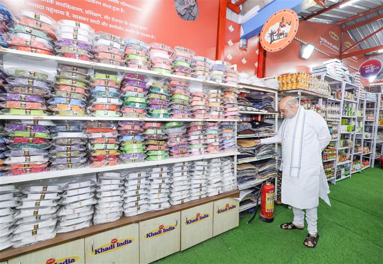 The Union Minister for Home Affairs and Cooperation, Shri Amit Shah visits Khadi India showroom on the occasion of Gandhi Jayanti at Connaught Place, in New Delhi on October 02, 2025.