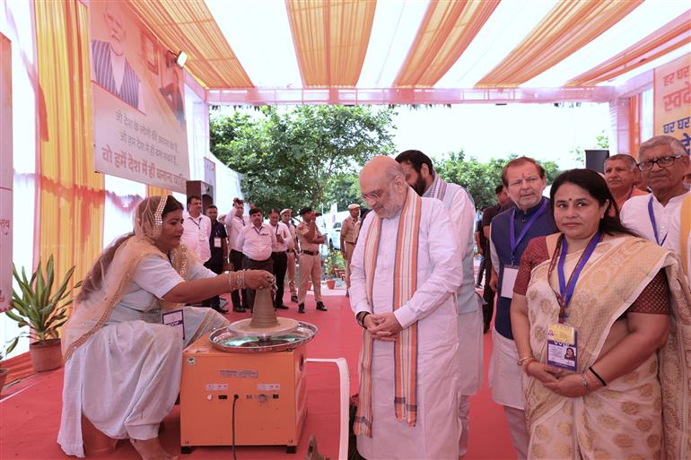 The Union Minister for Home Affairs and Cooperation, Shri Amit Shah attends the ‘Khadi Karigar Mahotsav’ at Rohtak, in Haryana on October 03, 2025.