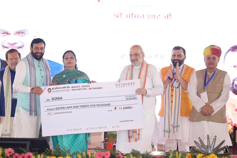 The Union Minister for Home Affairs and Cooperation, Shri Amit Shah attends the ‘Khadi Karigar Mahotsav’ at Rohtak, in Haryana on October 03, 2025.